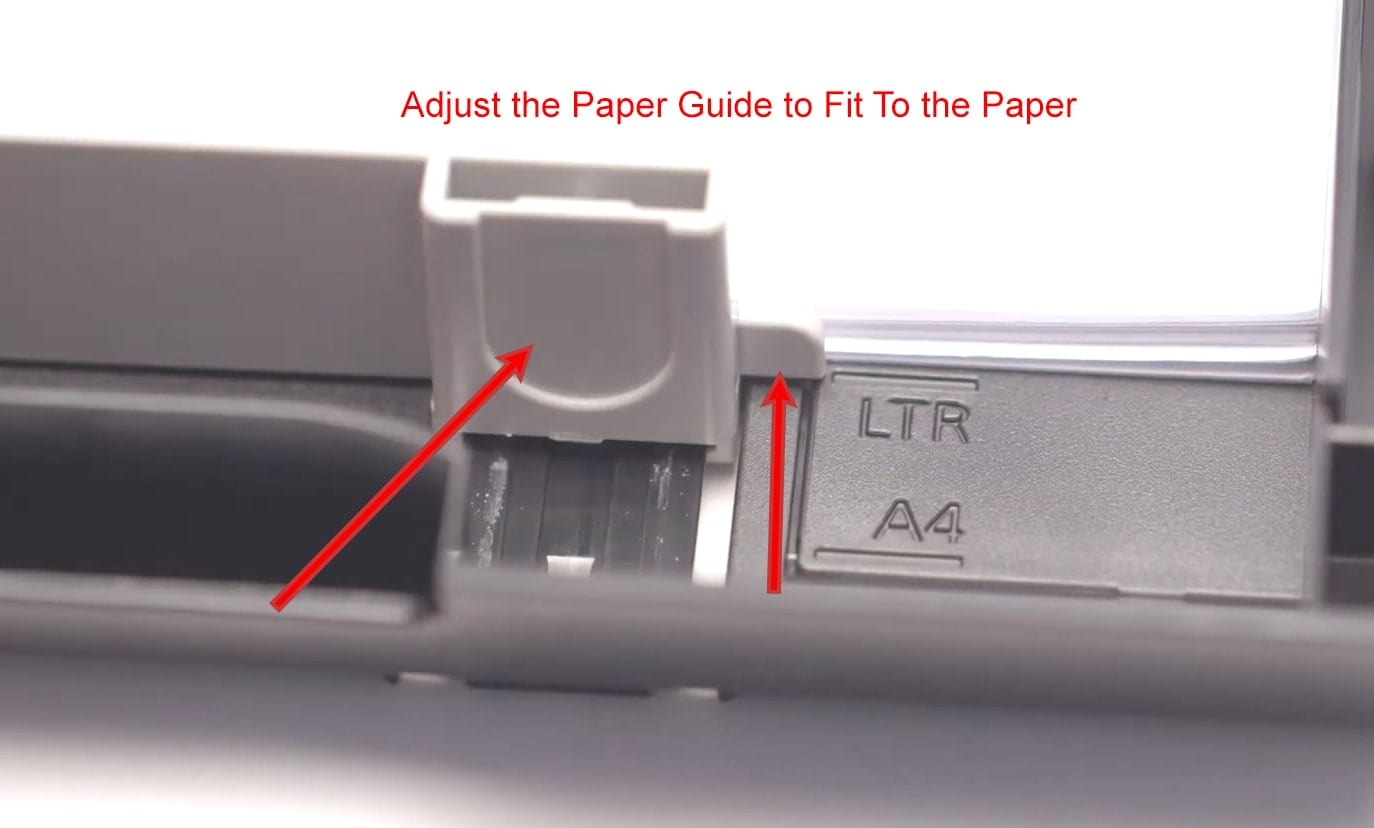 Adjust the Paper Guides To Fit The Paper Into the Tray